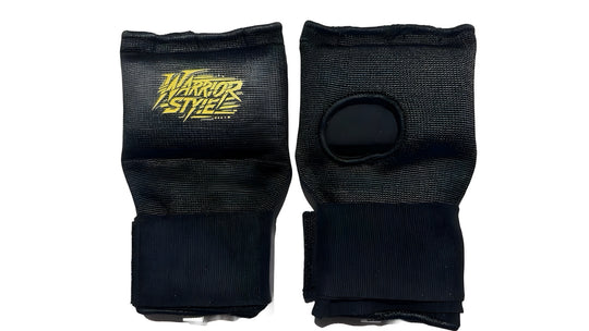 Quick Gel Hand Wraps Black wrist guards with yellow logo on a white background quick hand wrap tutorial    a product of https://www.shopwarriorstyle.com/

