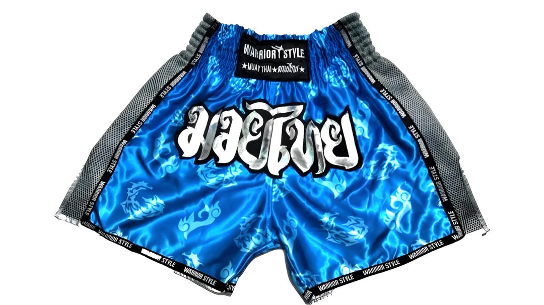 Muay Thai Shorts Blue and black shorts with white text on a white muay thai shorts twins venum muay thai shorts
a product of https://www.shopwarriorstyle.com/
background