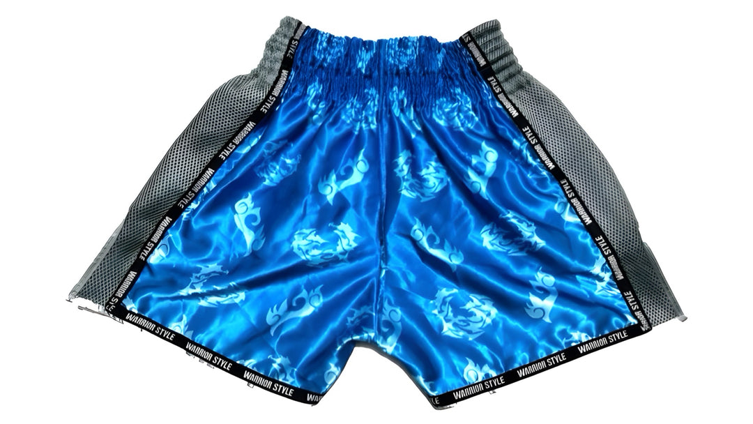 Muay Thai Shorts Blue and black shorts with white text on a white muay thai shorts twins venum muay thai shorts
a product of https://www.shopwarriorstyle.com/
background