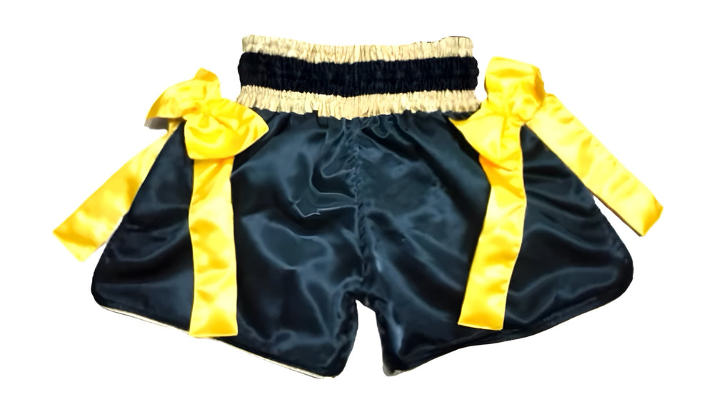 Muay Thai Shorts Black boxing shorts with yellow accents and a skull design on a white background muay thai shorts for men muay thai shorts twins  a product of https://www.shopwarriorstyle.com/
