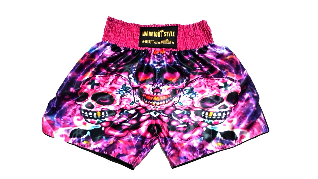 muay thai shorts Skateboard shorts with skull design and pink waistband on a white background  muay thai shorts for men muay thai shorts twins venum muay thai shorts a product of https://www.shopwarriorstyle.com/
