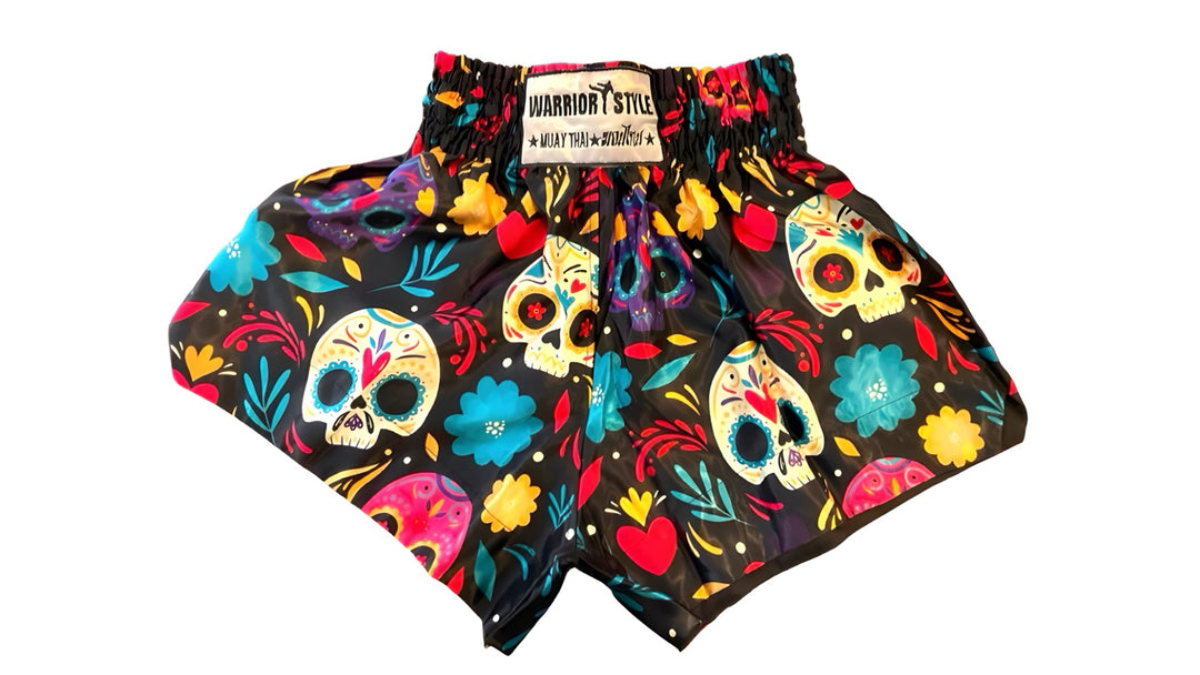 muay thai shorts Colorful muay thai shorts with skull design on a white background muay thai shorts for men muay thai shorts twins a product of https://www.shopwarriorstyle.com/
background