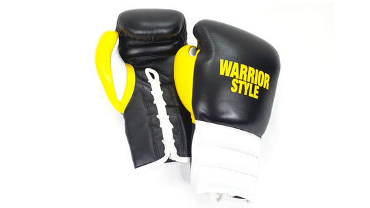 A pair of black and red boxing pro fight gloves with 'WARRIOR STYLE' written on them a product of https://www.shopwarriorstyle.com/
